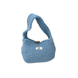 Light blue chunky knit tote bag with egg tag and button closure for daily casual use