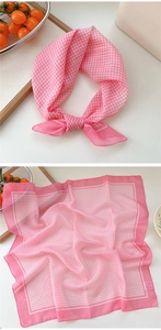 Detailed view of pink plaid cotton linen square scarf with translucent fabric texture