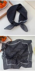 Polka dot cotton linen square scarf with vintage white spots on black fabric texture