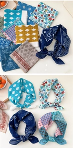 Flat lay of retro floral cotton linen square scarves with bohemian patterns and textures
