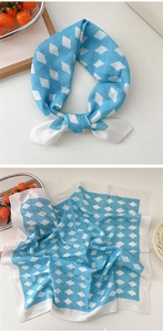 Detail of light blue diamond pattern square scarf in cotton linen with French chic style