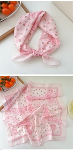 Pink cotton linen scarf featuring a red cherry pattern and paisley print detail