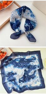 Detailed close-up of retro map print on navy blue and white cotton linen scarf
