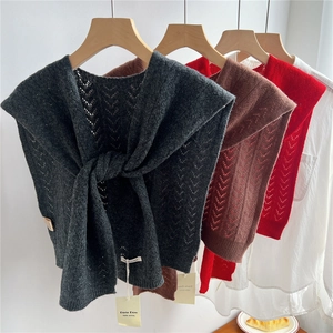 Three multi-color 100% wool hollow knit capes with tie-up design for women