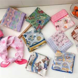 Collection of stylish cotton and linen square scarves with diverse fashion patterns