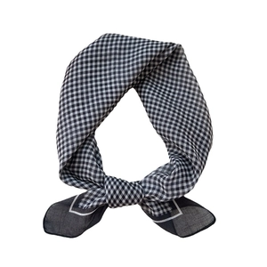 Elegant black and white gingham cotton linen square scarf with classic knotted styling