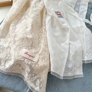 White floral lace and daisy embroidered mesh mini skirt with vintage ballet aesthetic
