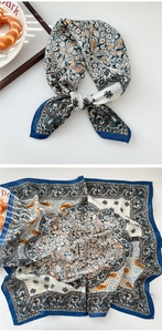 Détail d'un foulard en coton-lin à motifs cachemire et fleurs, avec décor élégant à la française