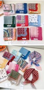 Detailed collection of polka dot and cat print small square scarves with brand tags