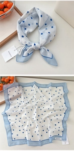 Detail of blue polka dot cotton linen square scarf with be keen on brand tag
