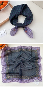 Close-up of vintage polka dot square silk scarf with floral patterns and luxury star border