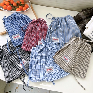 Plaid and striped layering skirt extenders with drawstring for a stylish JK look