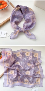 Detail of light purple paisley and rose pattern square scarf with fine stitched edges
