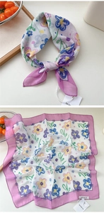 Detail of floral cotton linen square scarf with hand-painted patterns and pink border