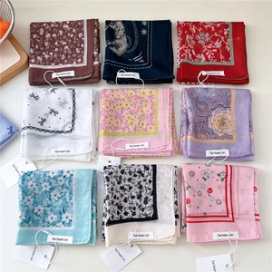 Collection of printed cotton linen square scarves with floral and geometric patterns