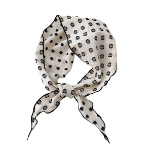 Polka dot cotton linen neckerchief in cream and black for retro fashion styling