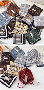 Close-up of 100% cotton square scarves featuring leopard, paisley, and plaid patterns