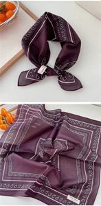 Detail of soft 100% cotton square scarf featuring white paisley pattern and purple texture
