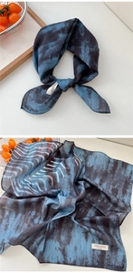 Close-up of tie-dye cotton scarf featuring West Lafayette text and rich ink texture