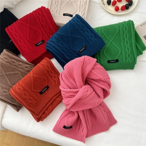 Classic 100% wool knitted scarves in multiple colors featuring thick twist cable patterns