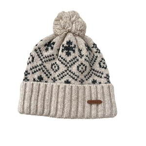Winter knit beanie with snowflake pattern, pom-pom top and warm ribbed fold-over cuff