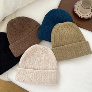 Striped wool knit beanies in various colors for winter warmth and outdoor protection