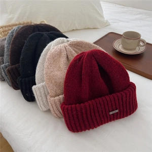 Solid knit beanies for women in five colors with thick warm fabric for winter outdoor wear