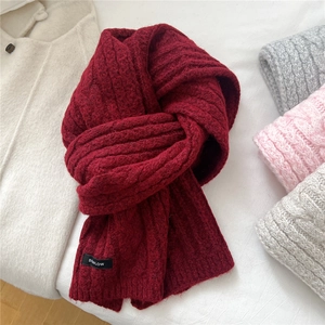 Thick wool blend chain-knit winter scarf in burgundy with a minimalist woven brand label