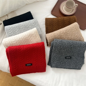 Chunky wool blend cable knit scarf for women available in multiple solid colors