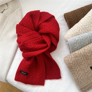 Classic red wool blend cable knit scarf with five color variations for winter warmth