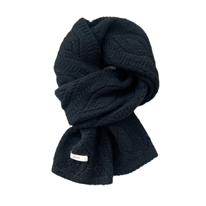 Knitted wool blend scarf in black cable knit design with white woven label detail