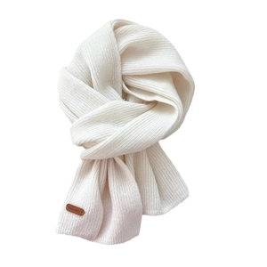 Minimalist white ribbed knit wool scarf for women with brown leather brand tag detail