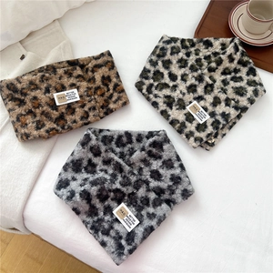 Thick leopard print plush neck warmer in brown, grey and green with soft faux fur texture