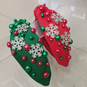 Red and green Christmas headbands with rhinestone snowflakes and festive pearls