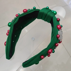 Green knit Christmas headband with red green pearls and rhinestone snowflake charms