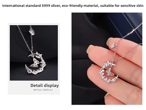 Detailed view of S999 sterling silver moon and butterfly necklace with luminous enamel