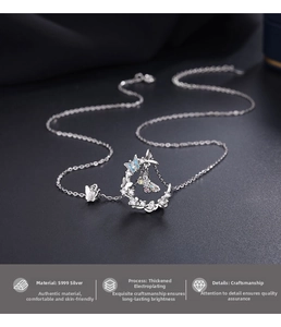 Macro detail of S999 silver butterfly pendant necklace with electroplated finish