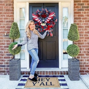 Patriotic eagle wreath with red white and blue ribbons for American Independence Day decor