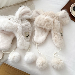 Plush winter earflap hat for women with cute animal ears and soft fur pom-poms