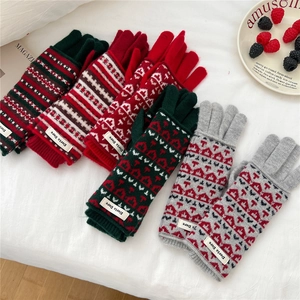 Winter jacquard knit gloves with Nordic Christmas patterns in green red and grey