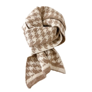 Classic brown and cream houndstooth knit scarf with a soft texture on white background