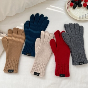 Five colors of wool knit gloves with touch screen design and cable knit cuffs for winter