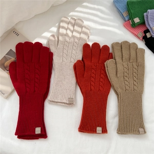 Chunky cable knit wool gloves for women in various colors for winter warmth