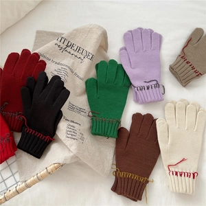Knit gloves with contrast stitching and two-finger touchscreen design in various colors