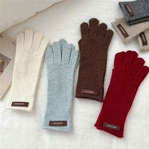 Knitted two-finger touchscreen gloves in multiple colors with leather logo patch detail