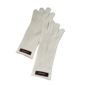 White knitted winter gloves with five-finger touch screen design and leather patch detail