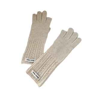 Beige ribbed knit touch-screen gloves with warm fleece texture and Doria Dore woven label
