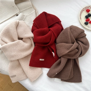Solid color wool knit scarves in beige, burgundy and brown for winter warmth