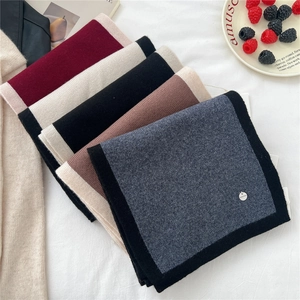 Soft wool knit scarf in multiple colors with 100% wool label for winter warmth