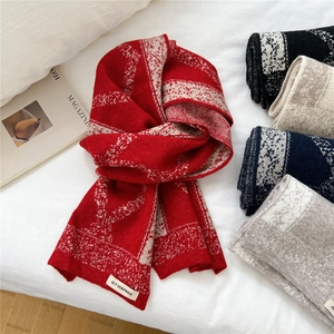 Bright red knitted scarf with white geometric jacquard pattern and multiple color options